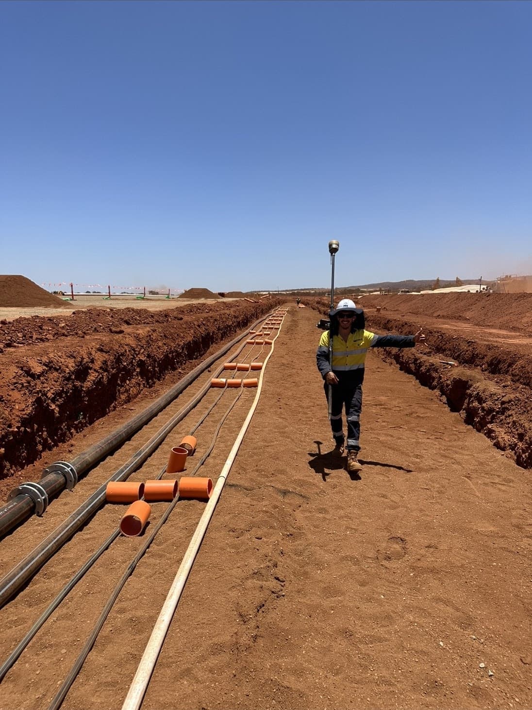 Survey crews establishing control near Western Range infrastructure